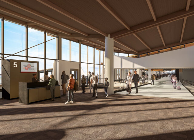 Spacious airport terminal with travelers, check-in counter, and large windows.